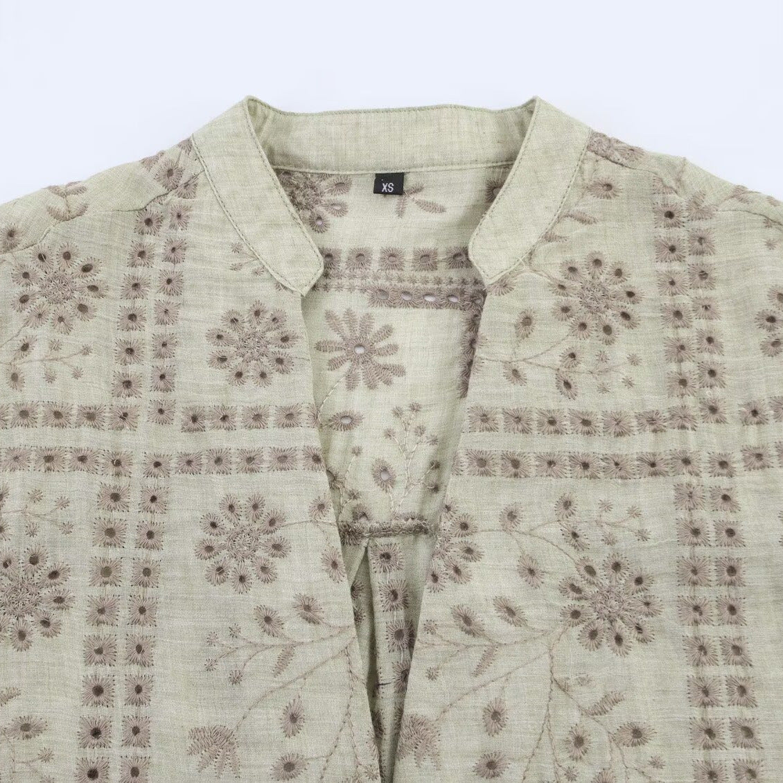 Simple hollowed out embroidered long sleeved shirt